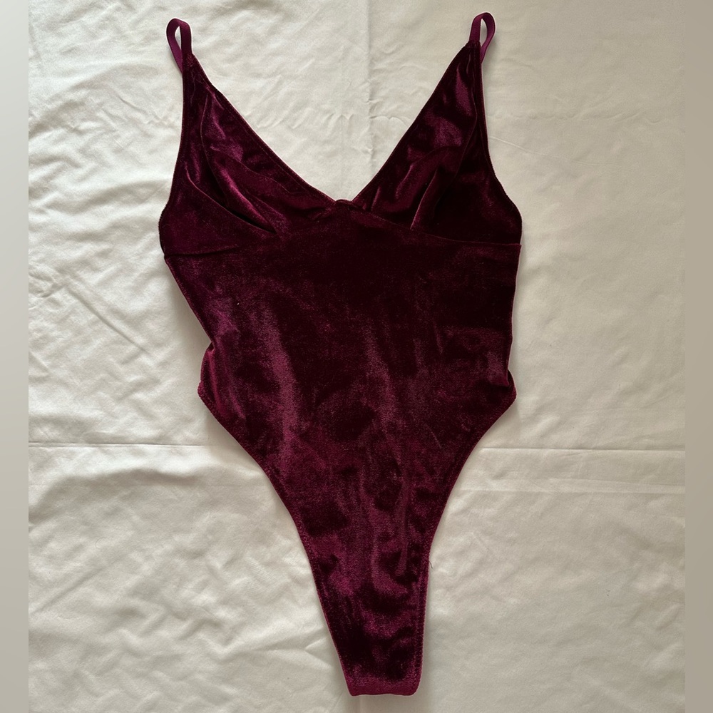 Velvet like material burgundy body suit